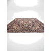 3x5-malayer-antique-rug-side-profile-5 {image_id: crop_4, image_type: detail_photo, alt_text: Detail view of the bottom right corner of the rug, displaying the rich color palette and visible weave.}