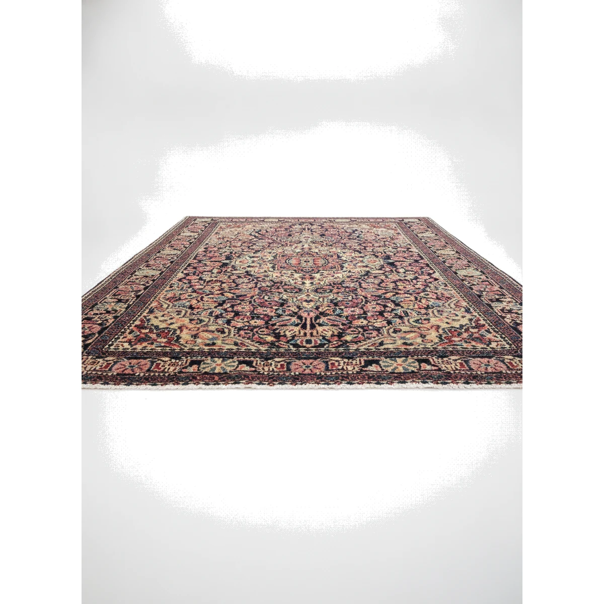 3x5-malayer-antique-rug-side-profile-5 {image_id: crop_4, image_type: detail_photo, alt_text: Detail view of the bottom right corner of the rug, displaying the rich color palette and visible weave.}