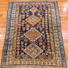 4′ x 6′ Deep Navy and Saffron Orange Hand-Knotted Antique Caucasian Shirvan Rug – Collector’s Wool