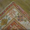 7′ x 10′ Antique Turkish Oushak Rug – Open Field Design, Soft Gold & Pastel Border