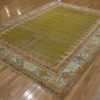 7′ x 10′ Antique Turkish Oushak Rug – Open Field Design, Soft Gold & Pastel Border