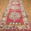 5′ x 11′ Turkish Rust Blue Medallion Runner – Vintage Hand-Knotted Wool