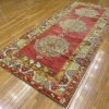 5′ x 11′ Turkish Rust Blue Medallion Runner – Vintage Hand-Knotted Wool